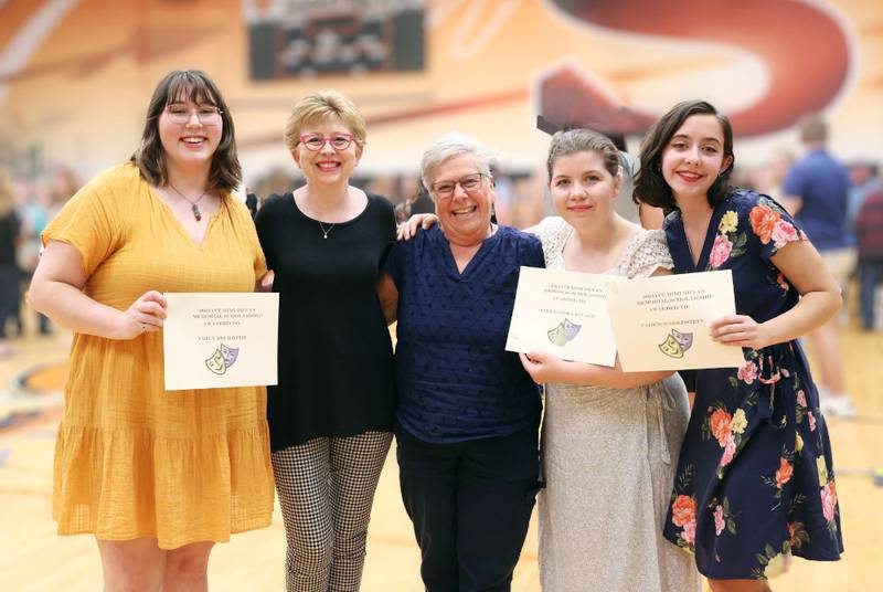 Shaw Local 2023 file photo – (From left) scholarship recipient Emily Beckwith, IVT Mimi Bryan Scholarship Committee member Kari Frantzen, IVT Mimi Bryan Scholarship Committee chair Sharon Pagoria, and scholarship recipents Aleksandra Savage and Cadence Goldstein at  Sandwich High School's Senior Awards Night. 2025 scholarship applications are due April 1.