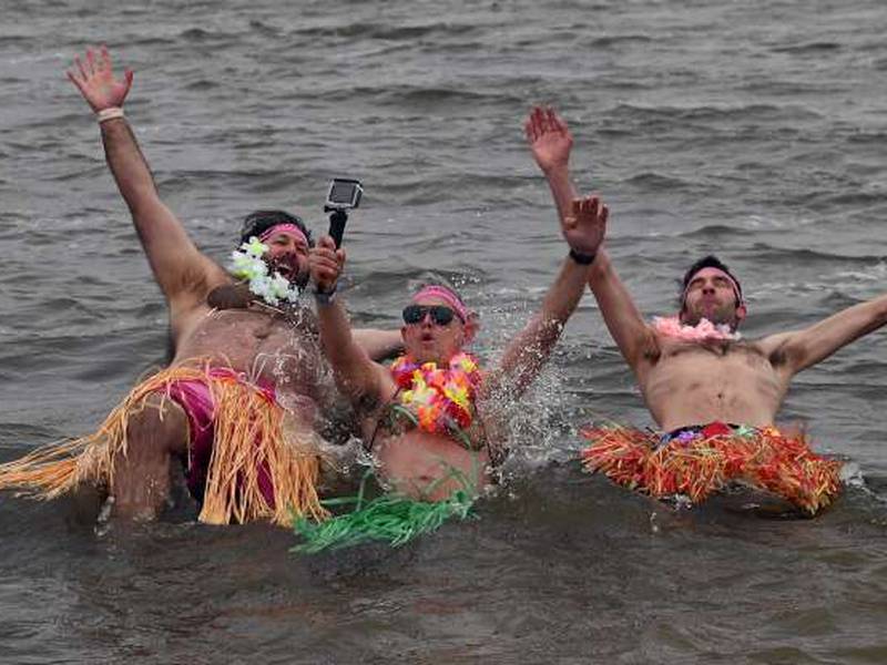 (Almost) freezing for a reason: More than 150 take the polar plunge in Fox Lake
