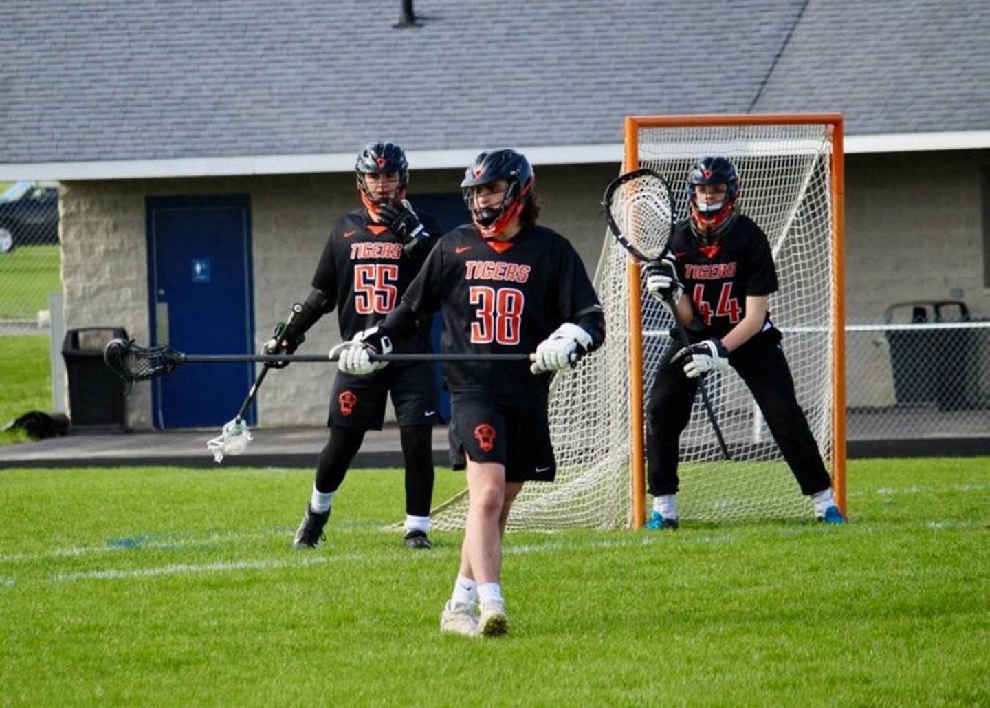 Crystal Lake Central's Hunter Doppke (55), Bryce Casimino and Joey Joswiak (44).