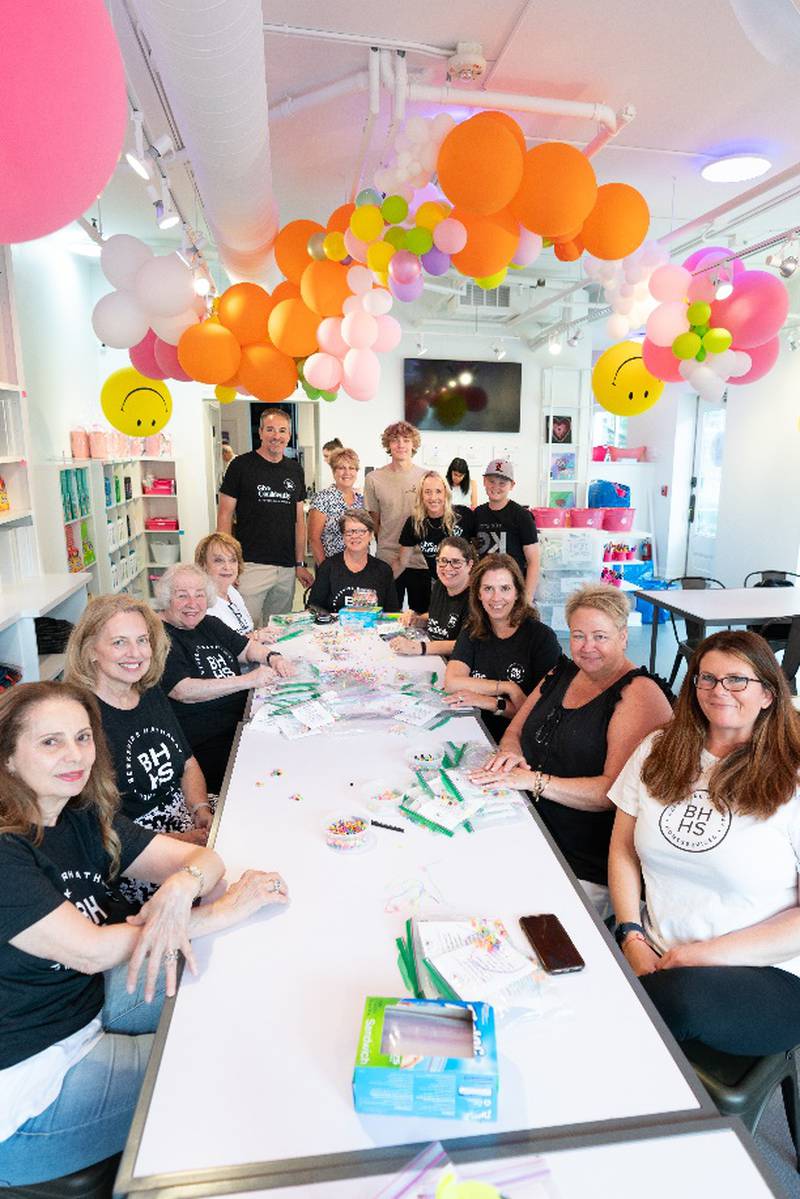 Agents and staff from the Libertyville office of Berkshire Hathaway HomeServices Chicago packed school care packs and backpacks with new supplies for Fill A Heart 4 Kids during the firm’s annual Community Kindness initiative.