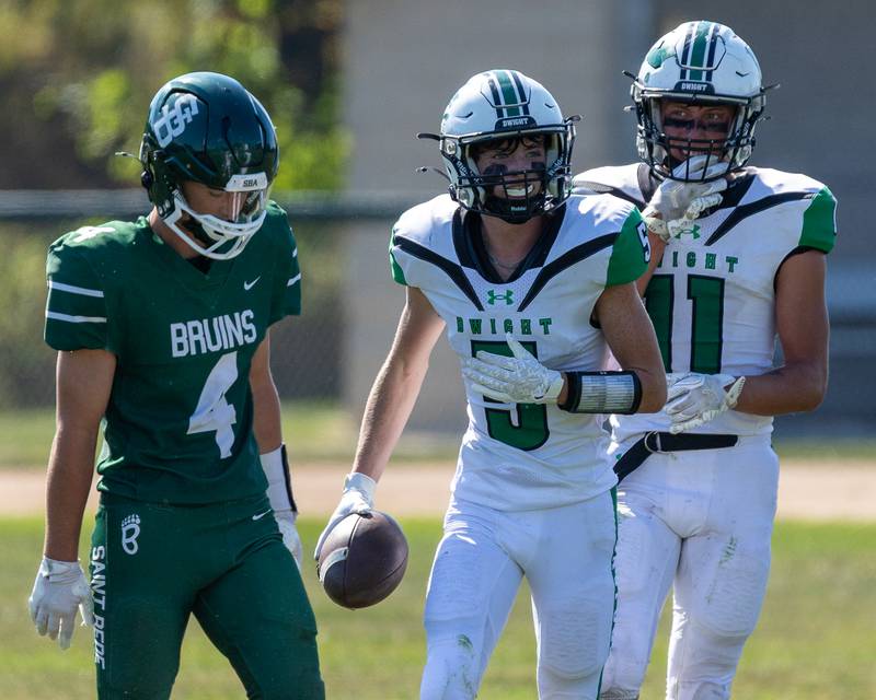 Joe Duffy (5) of Dwight runs back to sideline after scoring touchdown on Saturday, Oct. 4, 2025 at Captain Thomas J. Heitmann field in Peru.