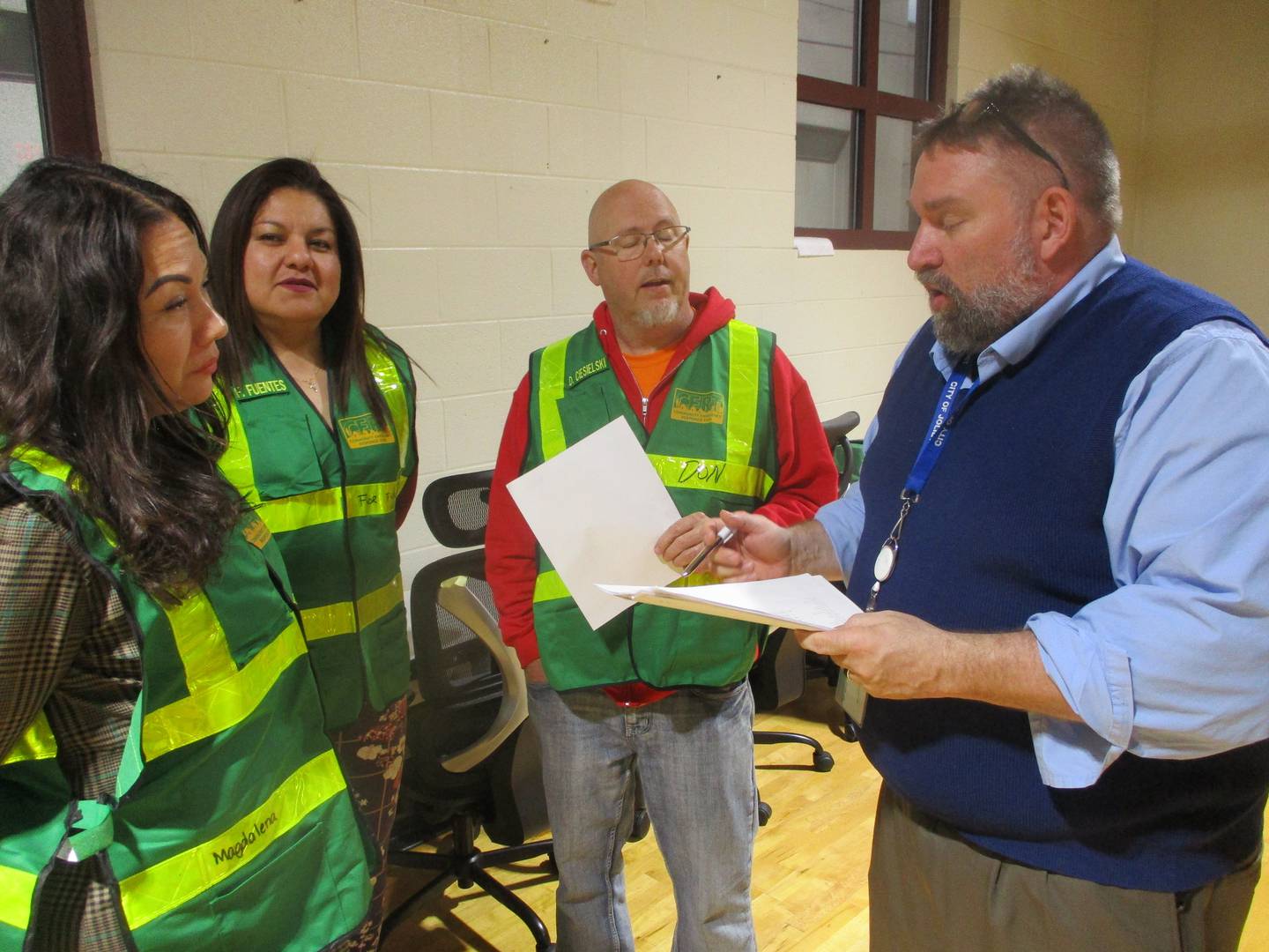 John Lukancic (right), director of the Joliet Office of Emergency and Disaster Management, meets with some of the first members of Certified Emergency Response Team on Thursday. May 22, 2025