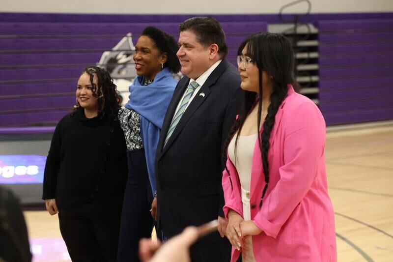 JJC student Jessica Lopez, Lieutenant Governor Juliana Stratton, Illinois Governor JB Pritzker, and JJC student Jazmin Martinez pose for a photo after a press conference regarding the state’s proposed investment in higher education at Joliet Junior College on Thursday, March 16th, 2023.