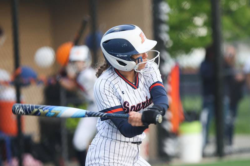 Romeoville’s Kalli Tang locks in on a pitch against Joliet Central on Tuesday, April 28, 2026 in Romeoville.
