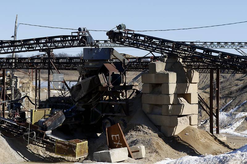 The crushing machine that breaks rocks into smaller rock on Friday, Feb. 10, 2023, at Thelen Sand and Gravel, 28955 W. Route 173 in Fox Lake.