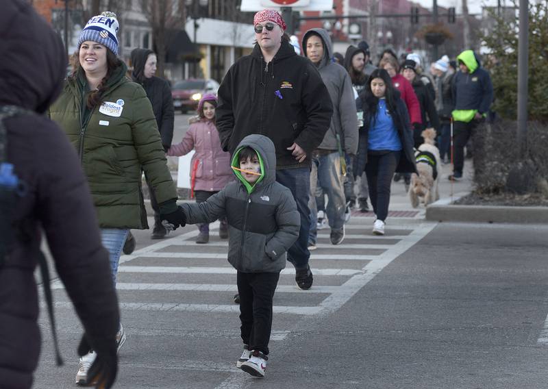 Hundreds showed up to walk the downtown streets of Ottawa Saturday evening for the Illinois Valley PADS sponsored “The Coldest Night Of The Year”, one-mile walk for walkers to sample the challenge of those who are homeless in the winter. The fundraising event contributed to the vital needs to support the growing homeless population in the Illinois Valley area.