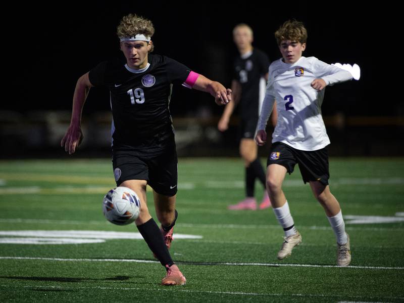 Manteno's Maddox Toepper controls the ball past Chicago Christian's Dylan Lenarz, right, in a sectional game on Tuesday, October 28, 2025.