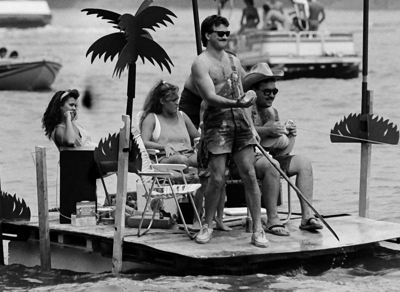 The Anything That Floats races were held from 1978-1986 each year in Peru. Contestants received a free case of Old Style beer upon entering. The rules were simple. To enter, participants needed to build a raft less than 50 feet in length and each person had to have a life jacket on board whether you wore it or not. A rope had to be attached to the raft for towing. Rafts were made from styrofoam, inter tubes or barrels. A minimum of two paddles were required on the float. Rafts were launched at the Starved Rock Boat Ramp and finished at the Peru boat launch area. Overtime, the event grew and got to big and out of control that organizers had to scrap it. This photo was found in the La Salle NewsTribune archives.