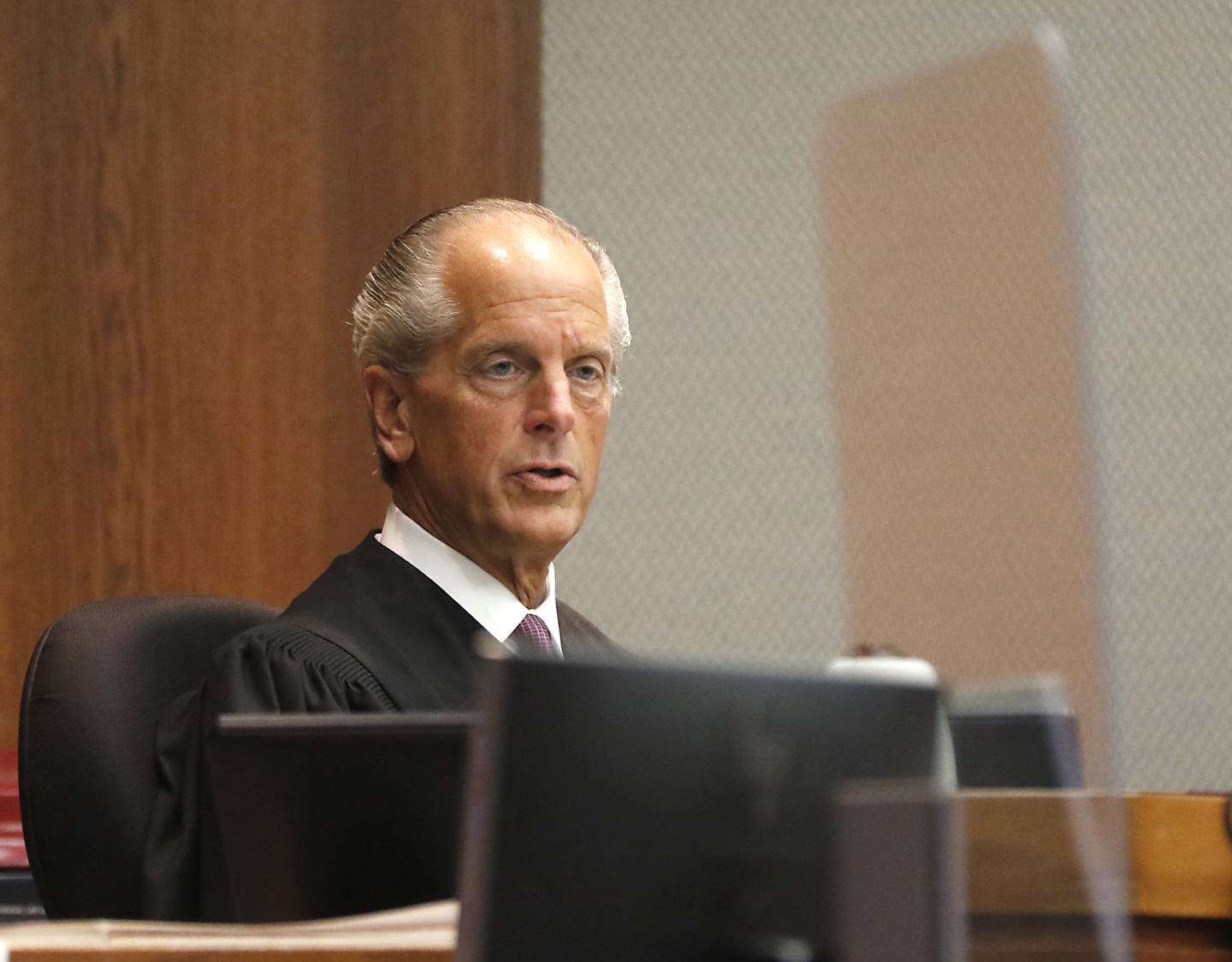 Judge Michael Coppedge rules on a motion during the trial of Robert J. Gould, 56, on Monday, Nov. 14, 2022. Gould, who was on McHenry County’s most wanted list when arrested in 2017, is accused of repeatedly sexually abusing two children throughout their childhoods beginning in 2001.