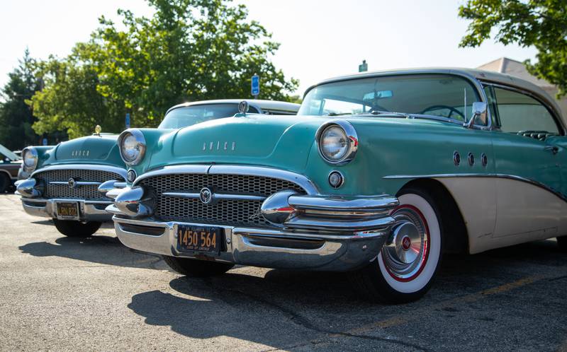 A 1955 Buick Special owned by Woodridge resident Dwayne DeNava sits next to his 1955 Buick Roadmaster during the Moose Cruise Night at the Moose Lodge  in Downers Grove on Friday, June 3, 2023. The Buick Special has been in his family for thirty years.