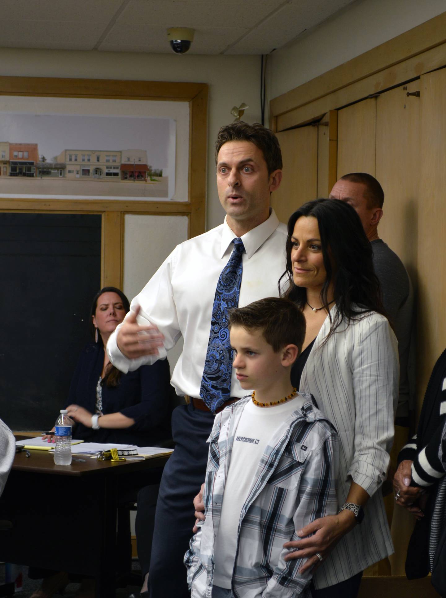 Mt. Morris Police Chief Michael Cicchetti, left, introduces himself to community members just before being sworn in as chief during the April 12 village board meeting. Also pictured are his wife, Michelle Cicchetti, and youngest son, Caysen Cicchetti.