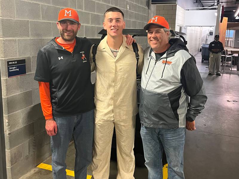 McHenry assistant baseball coach Zach Badgley, former player Bobby Miller and head coach Brian Rockweiler after Miller's major league debut with the Los Angeles Dodgers.