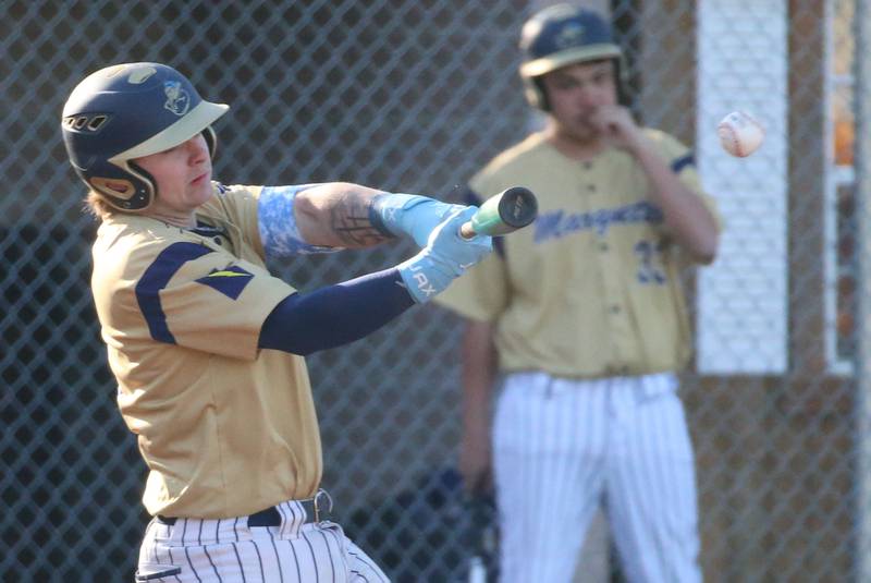 Marquette's Jaxsen Higgins gets a hit against Newark on Monday, March 23, 2026 at Newark High School.