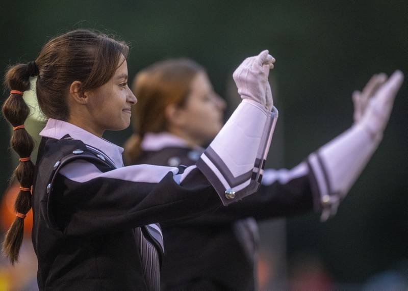 Drum Major Victoria Campbell keeps rhythm for the Cavaliers Marching bands pregame performance at Howard Fellows Stadium on September 8, 2023.