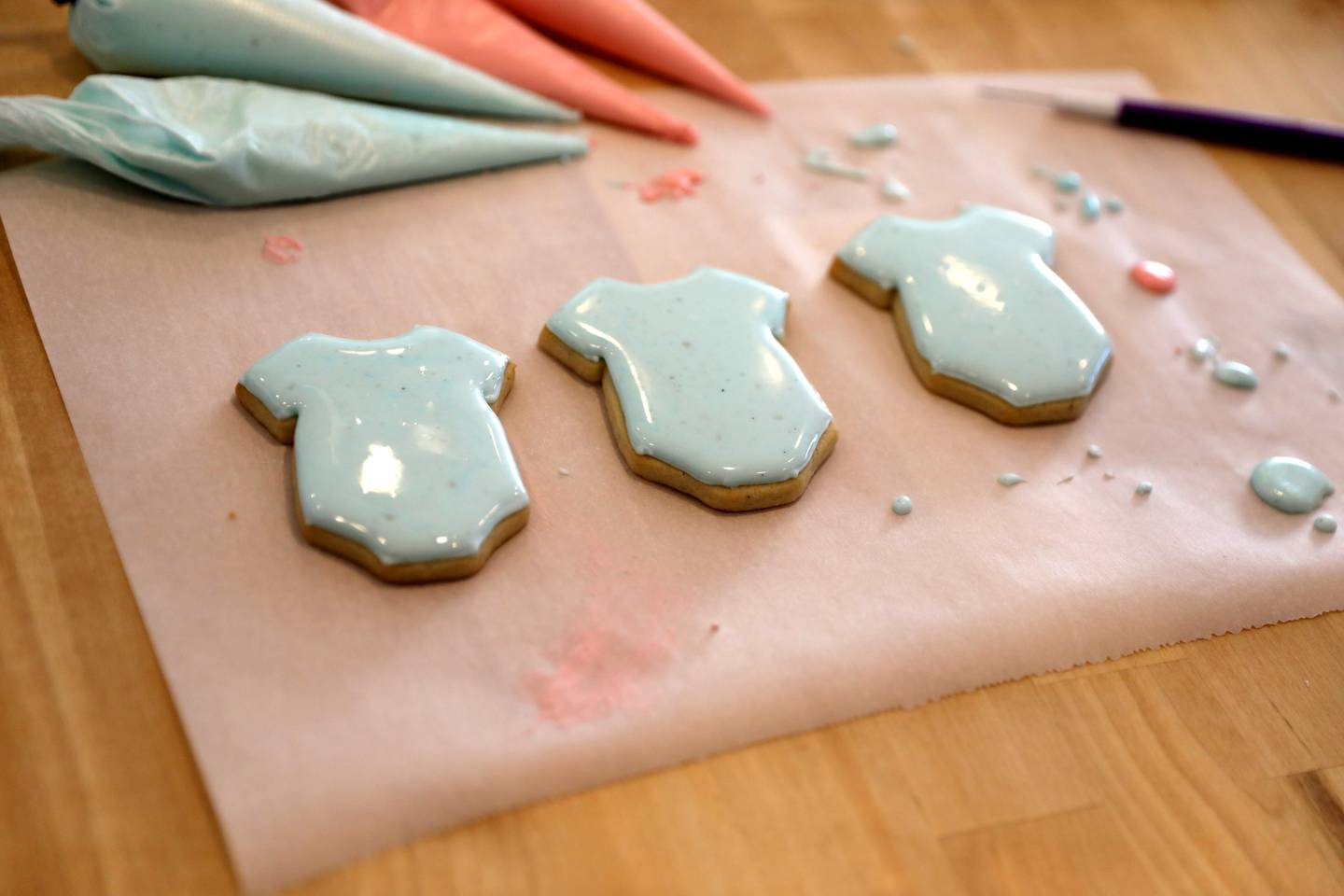 Alyssa Altman, 20, makes cookies for a gender reveal party in the kitchen of her Geneva home. Altman started a cookie business during the Covid-19 pandemic when she was a junior in high school. Now a junior at Northern Illinois University, she continues to bake.