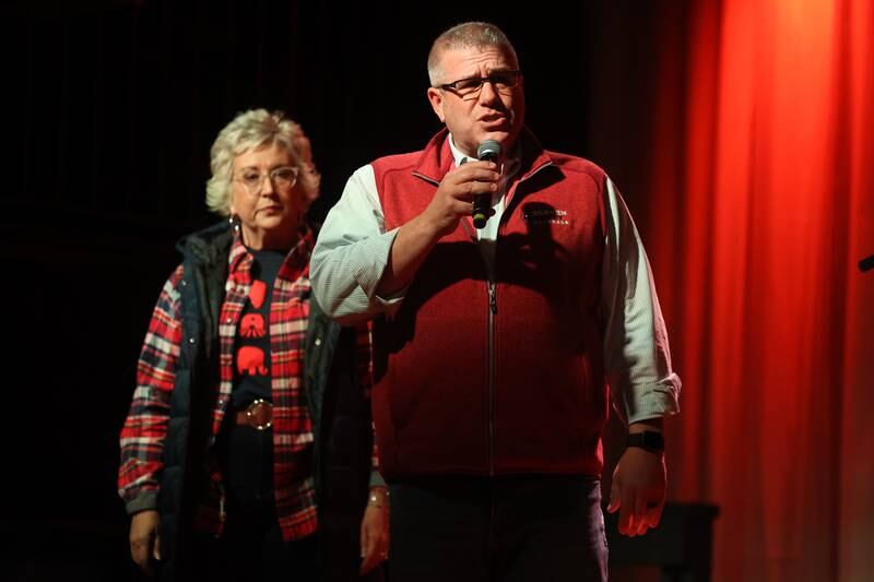 Darren Bailey, Republican candidate for Illinois Governor, stands with his wife Cindy Stortzum at the GOP rally at 115 Bourbon Street in Merrionette Park on Monday.