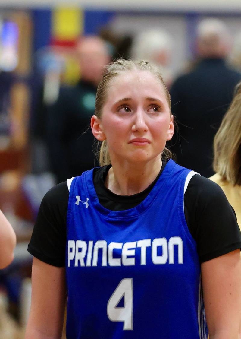 Princeton senior Paige Jesse takes a glance at the final score after the Tigresses fell to Alleman 40-27 in Thursday's regional championship game at Prouty Gym.