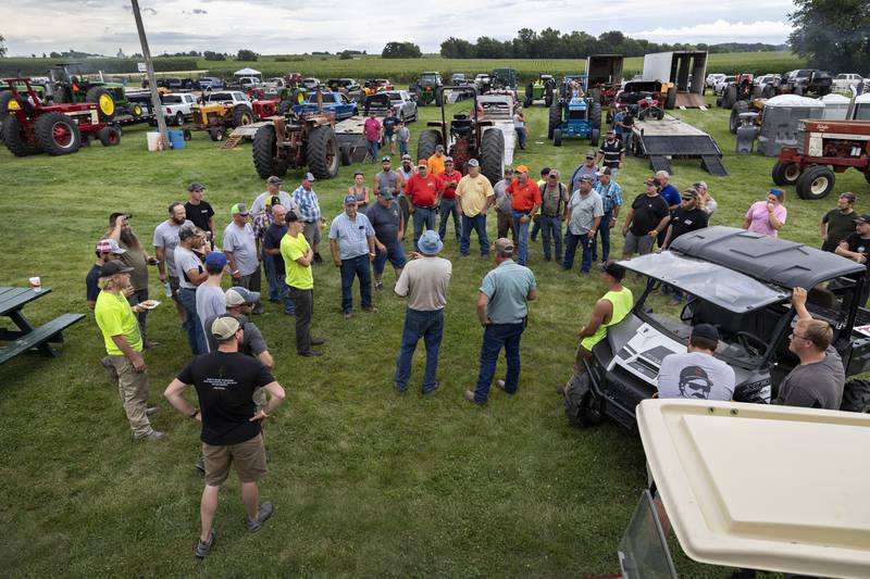 Drivers attend a meeting Thursday, July 24, 2025, before the start of the Lee County Fair’s truck and tractor pull.