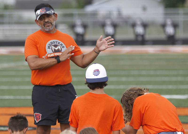 Gus Silva talks about what the players will learn during the Chicago Bears Mini Monsters Flag Football Camp on Wednesday, July 16, 2025. at McCracken Field in McHenry.