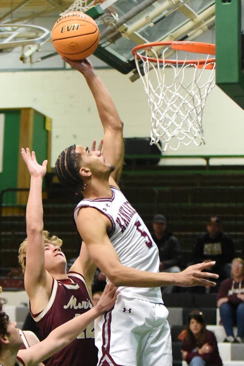 Kankakee's EJ Hazelett puts back an offensive rebound during the Kays' IHSA Class 3A Geneseo Regional semifinal against Morris Wednesday, Feb. 25, 2026.
