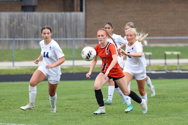 Beecher's Braelynn Scanlan controls a pass as Peotone's Peyton Bisping, right, and Kiersten Bettenhausen close in during Peotone's 2-1 victory over Beecher in the Class 1A Manteno Regional championship on Friday, May 22, 2026.