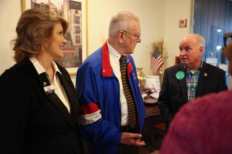Kathy Salvi, candidate for US Senate, left, Ed Petka and Dan Brady, Republican candidate for Secretary of State, talk at the GOP event at Its Amazing in Joliet on Monday.