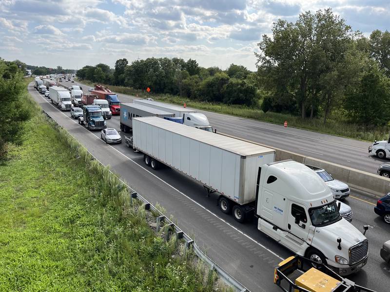 Traffic is backed up along Interstate 55 near Joliet as lanes are blocked off following debris falling from the I-55 bridge on Monday, Aug. 19. 2024.