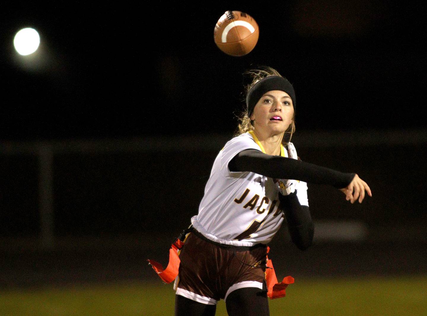 Jacobs’ quarterback Olivia Fillipp passes against Rockford Guilford in varsity flag football sectional action at Dan Horne Field on the campus of Harvard High School in Harvard  on Tuesday, Oct. 15, 2024.