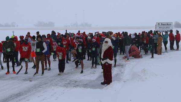 Photos: Santa spirit takes over Spring Valley for annual 5K race