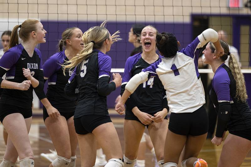 The Dixon Duchesses celebrates in their match against Morris Thursday, Oct. 31, 2024 in the class 3A regional championship at Dixon High School.