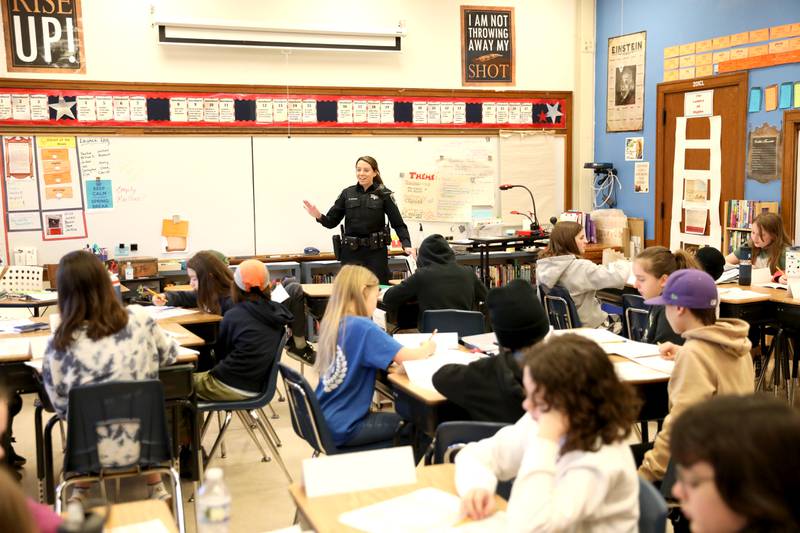 St. Charles Police Officer Meghan Kramer works with fifth-graders at Lincoln Elementary School in St. Charles.