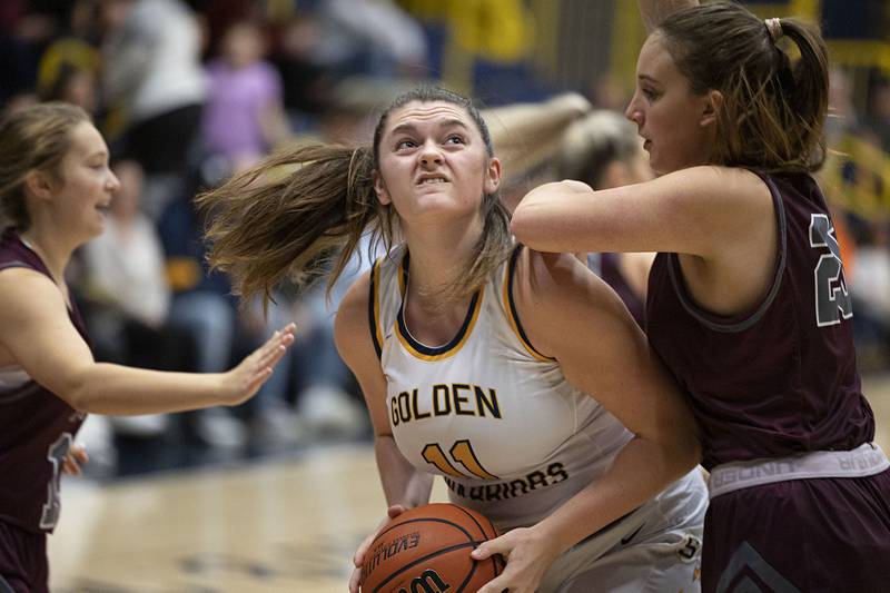 Sterling’s Kathryn Rowzee works below the basket against IVC’s Mary Zerfass Monday, Nov. 14, 2022.