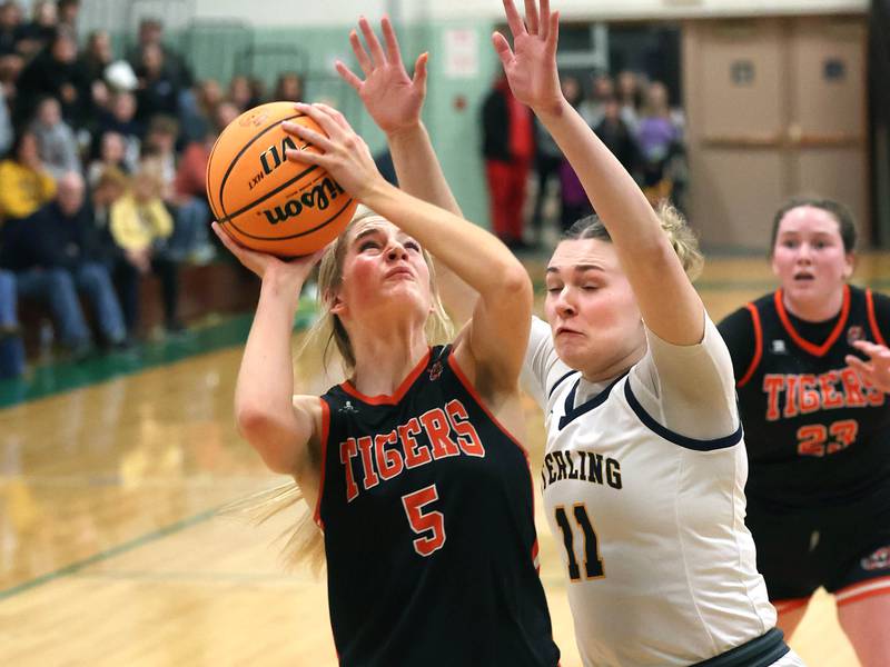 Crystal Lake Central's Ruby Macke shoots over Sterling's Natalie Eddinger during their Class 3A sectional semifinal game Tuesday, Feb. 25, 2025, at Boylan Catholic High School in Rockford.