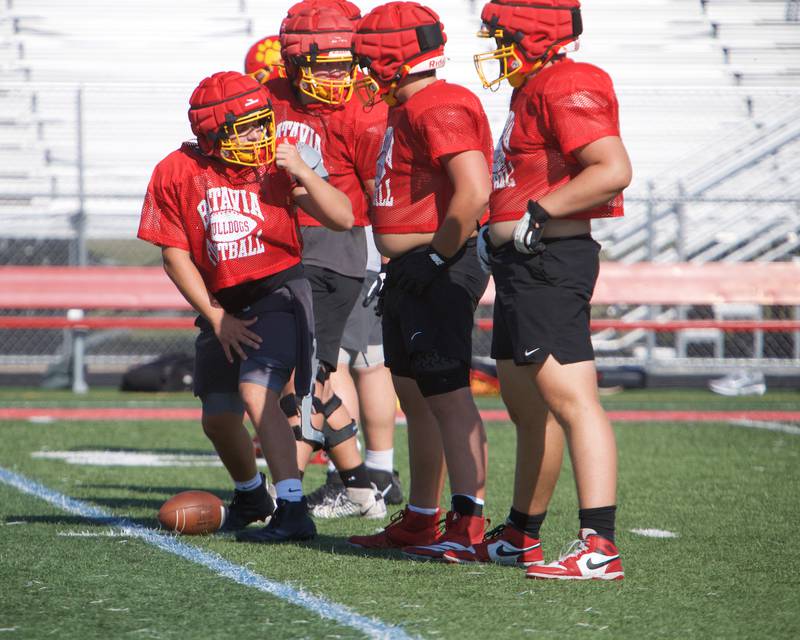 Batavia's Steven Bannos talks to the line before snapping the ball at Varsity football practice on Wednesday, Aug.13,2025 in Batavia