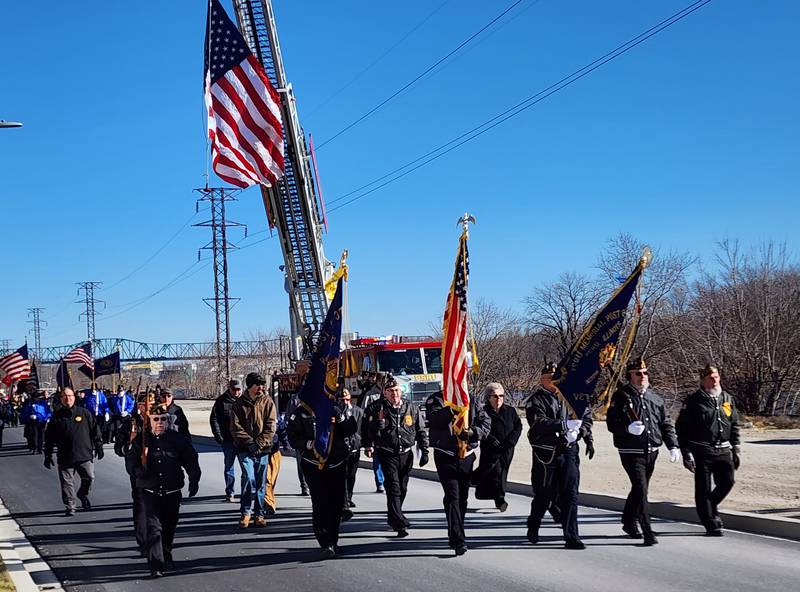 Saturday’s event featured marchers representing many branches of the military, local organizers, city officials, boy scouts and supporters coming together to pay tribute and remember those who lost their lives during the attacks on Dec. 7, 1941.