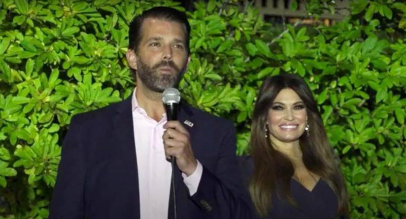 Donald Trump Jr. and Kimberly Guilfoyle give their remarks Oct. 13 at a Trump rally held at the Bull Valley Golf Club in Woodstock.