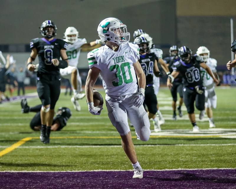 York's Jake Mellon crosses the goal line to score a first half touchdown during football game between York at Downers Grove North.  Sept 29, 2023.