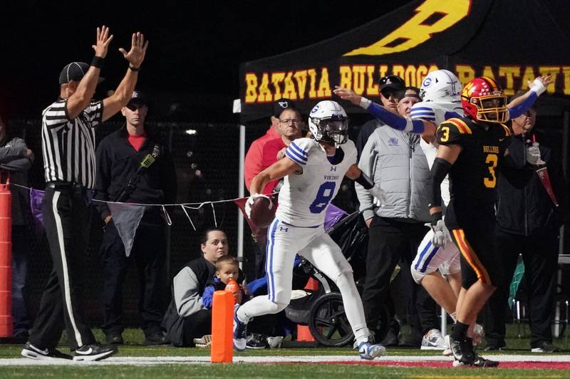 Geneva’s Finnegan Weppner (8) reacts after scoring a touchdown against Batavia during a football game at Batavia High School on Friday, Oct. 4, 2024.