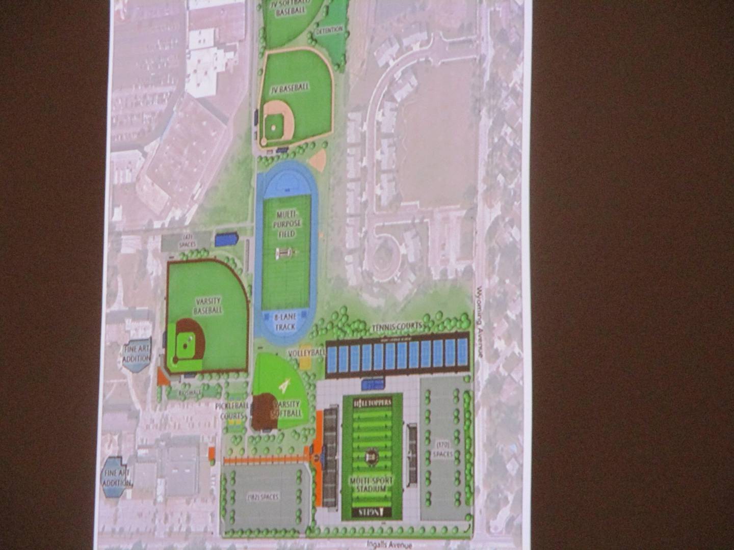 A graphic presented at the Joliet Catholic Academy community meeting on Wednesday shows the plan for new athletic fields and an on-campus multi-purpose stadium. Sept. 24, 2025