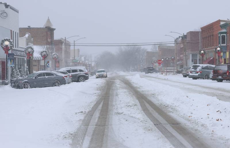 A car travels on East St. Paul Street on Saturday, Nov. 29, 2025 downtown Spring Valley.