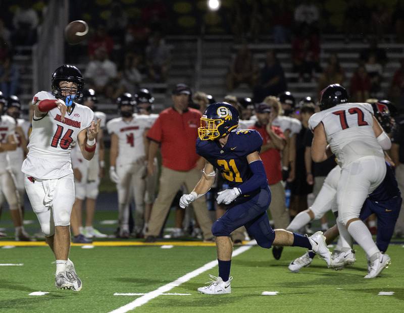 Metamora’s Stephen Petri fires a pass against Sterling Friday, Aug. 30, 2024 at Sterling High School.