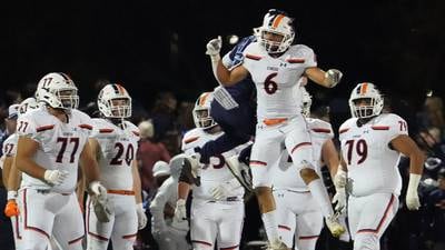 Oswego pulls away late to beat Oswego East, completes perfect regular season