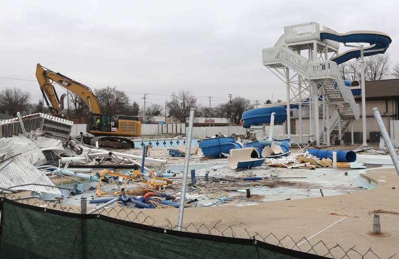 Demolition continues at Hopkins Pool Tuesday, December 10, 2024, in preparation for construction of a new pool set to open in 2026 at Hopkins Park in DeKalb.