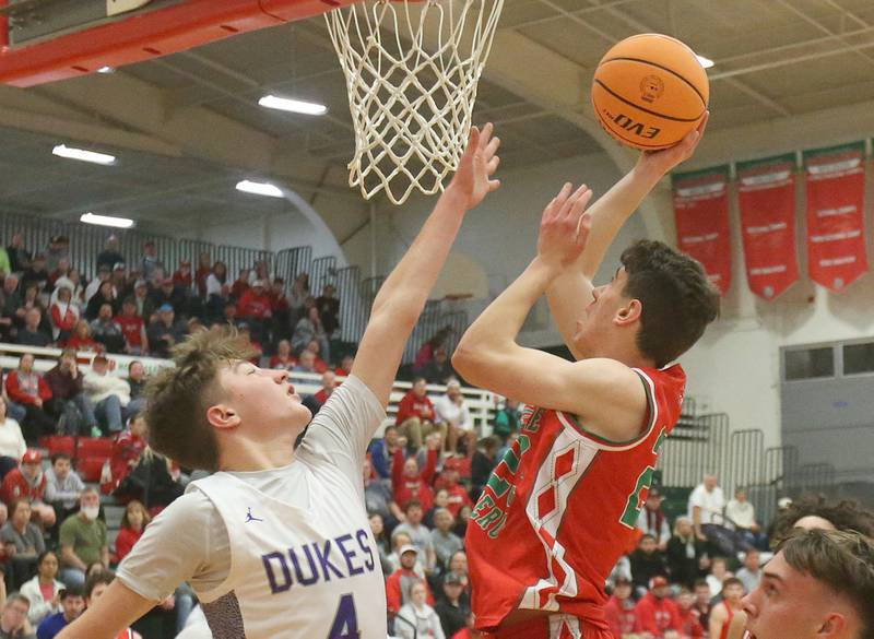 L-P's Nick Olivero drives to the hoop past Dixon's Brody Nicklaus during the Class 3A Regional semifinal game on Wednesday, Feb. 26, 2025 in Sellett Gymnasium at L-P High School.