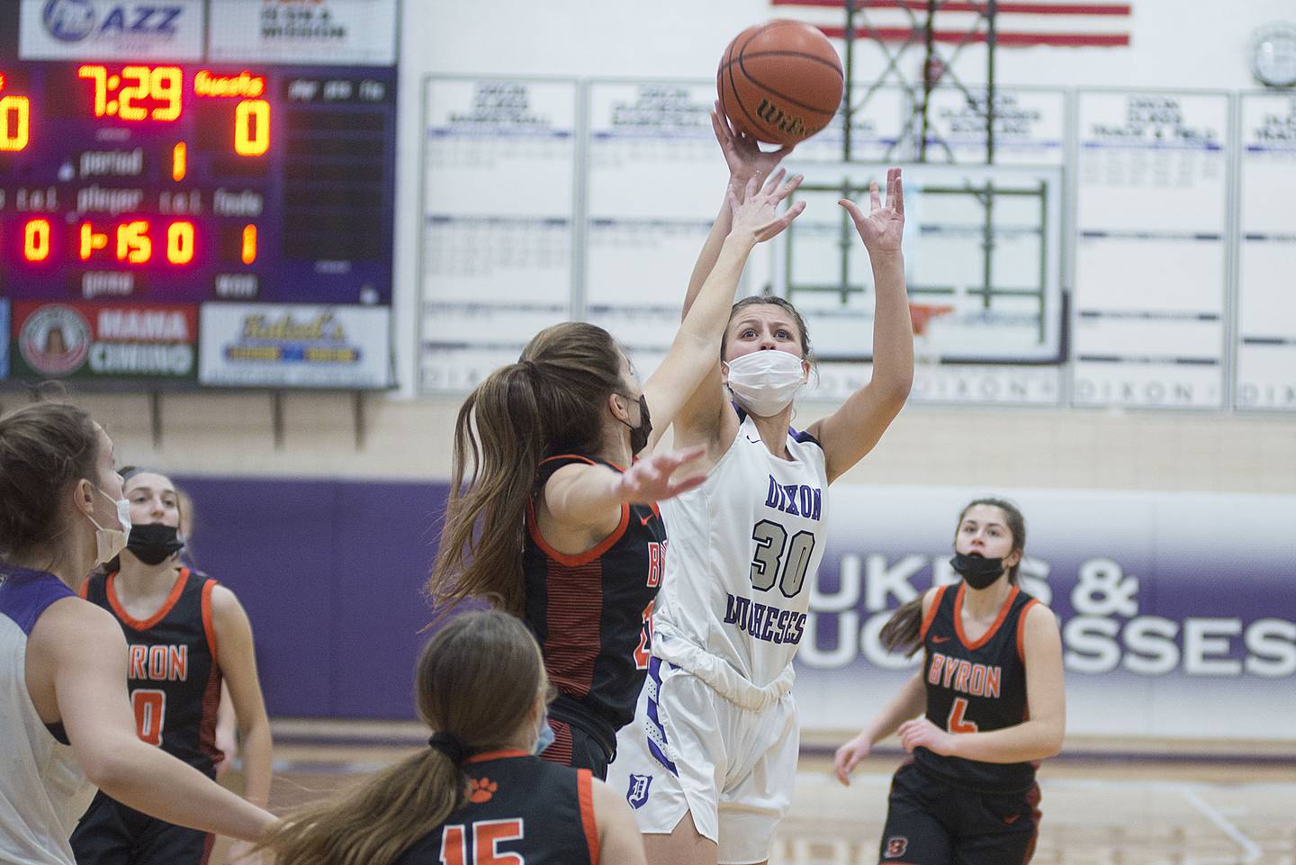 Dixon’s Harvest Day puts up a shot against Byron during the semifinal game at the KSB Dixon girl’s holiday basketball tournament Wednesday, Dec. 29, 2021.