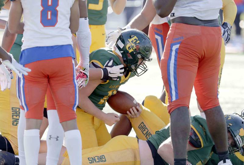 Elk Grove’s Jacob Elsner, 11, reacts after pushing in for a touchdown Saturday October 29, 2022 in Elk Grove Village.