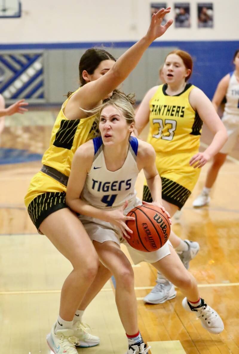 Princeton's Erin May eyes the bucket against Putnam County in tournament play at Princeton Monday. The Tigresses won 62-36.