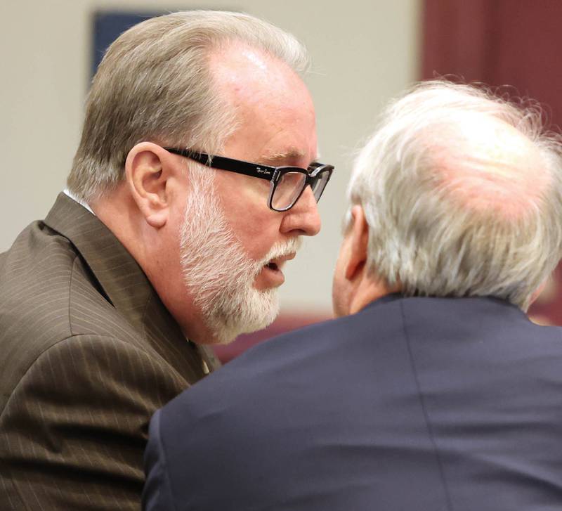 Former DeKalb School District 428 Superintendent Douglas Moeller talks to his attorney Clay Campbell during his trial Wednesday, Oct. 5, 2022, at the DeKalb County Courthouse in Sycamore. Moeller was charged in April 2018 with non-consensual dissemination of private sexual images, a class 4 felony.