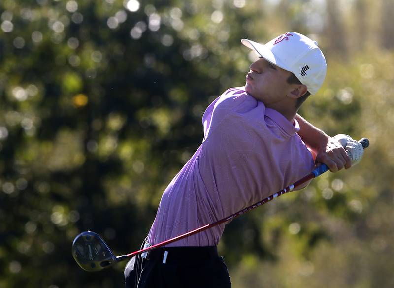 Hampshire’s Nolan Adamczyk watches his tee shot on the ninth hole during the IHSA Class 3A Dundee-Crown Regional golf tournament on Wednesday, Oct. 2, 2024 at Randall Oaks Golf Club in West Dundee.