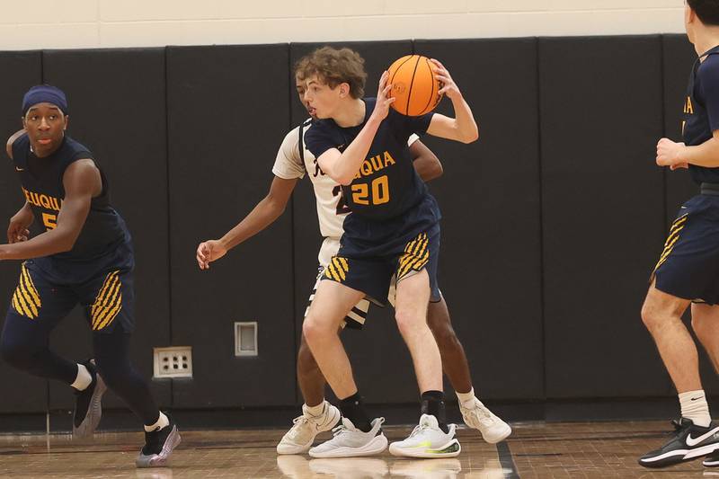 Neuqua Valley’s Luke Johnson secures the rebound against Lincoln-Way West on Saturday, Feb. 1, 2025.